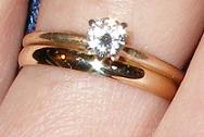rings - My engagement and (new) wedding ring. Do you notice how my engagement ring is squeezing my finger? I was barely able to get it on, but did so just for this picture. LOL