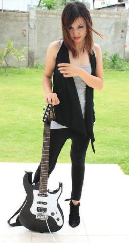 me - me having pictorials with my guitar