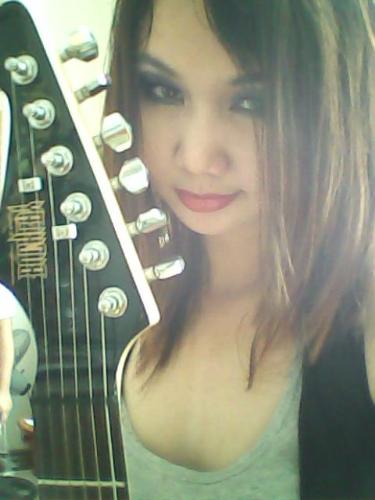 me - me loving the pictorials with my guitar
