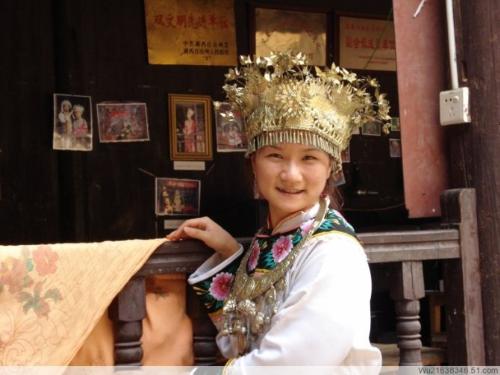 Liberty - You can feel the special breath of Chinese Minority nation from my head accessories and clothing. I'm sure that you cann't see it in the other countries. The Minority nation house, lifestyle, clothing, food is unique in the world. If you wanna to know more about it, welcome to China. You will be interested in it.