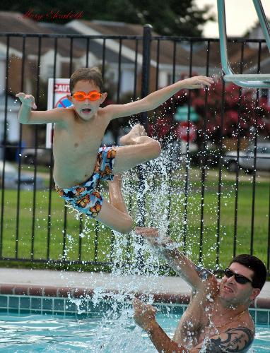 Fun at the pool - I used a shutter speed of about 650 frames per second to capture this image