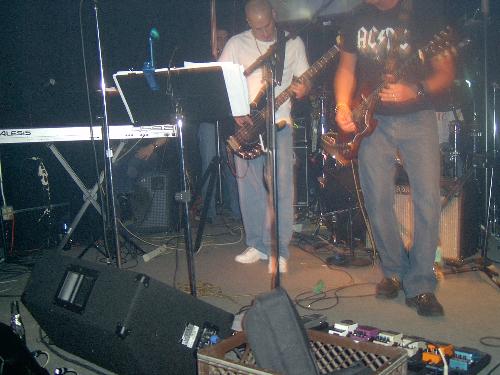 Donnie playing base - Here is my babys daddy playing base in a band in a bar in Chicago. Dont ask me which bar because there are so many I have no idea.