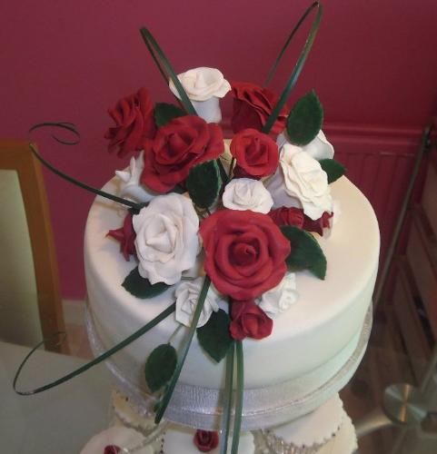 More detailed photo of cake topper - All of these flowers are hand made