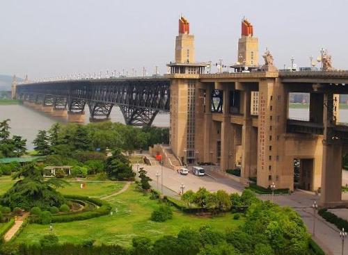 Nanjing Yangtze river bridge - The very first bridge along the Yangtze river boast with scenic views and favorite tourist spot in China. It is also coined as a suicidal bridge for many people are reported to have leaped to their deaths over the bridge. Nanjing Yangtze river bridge - The very first bridge along the Yangtze river boast with scenic views and favorite tourist spot in China. It is also coined as a suicidal bridge for many people are reported to have leaped to their deaths over the bridge.