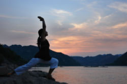 A woman practicing Yoga - A woman practicing Yoga
