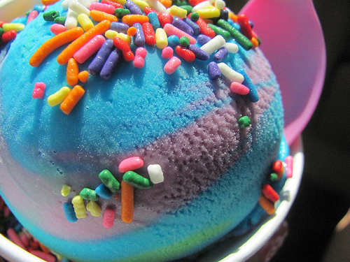 blue and purple - Deeply colored blue and purple ice cream with colorful sprinkles.