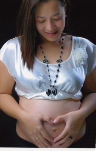 my preggy wife -  I am proud to be a father of our baby boy soon.