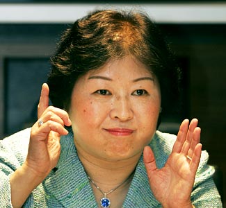 Zhang Yin, the world's wealthiest woman. - Zhang Yin, is named the world's wealthiest woman. Oprah Winfrey was ninth on the list.