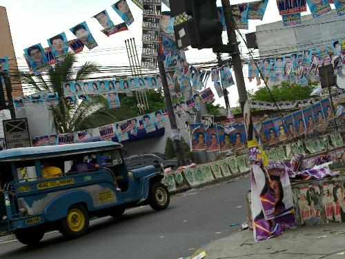 election in the philippines - ...the same sight every election season ...campaign posters everywhere.