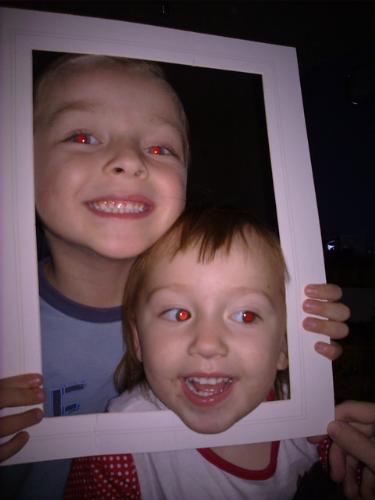 My Son and Daughter  - We was sorting out a photo frame and removed a border from around the side, as we wanted to make the frame much bigger than it would be with the border. My children decided it would be fun to play with it :)