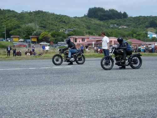drag race - two riders to burn it out in a drag race