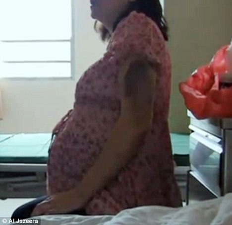 Human rights violation  - Xiao Aiying allowed cameras to film her in the hospital. The bruise on her arm is from the alleged beating she received before offficials injected her baby. She may require surgery to remove pieces of placenta still in her uterus

Read more: http://www.dailymail.co.uk/news/article-1322601/China-forces-woman-abortion-EIGHT-months-breaching-child-policy.html#ixzz14EIS6nib