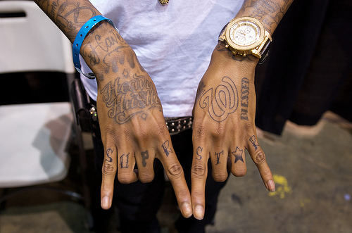 Taylor Gang Hand Sign Meaning