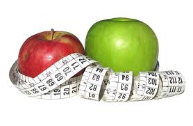 Tape Measure and Apple - Apple food that is great when you are dieting and a Tape Measure to check your improvement.