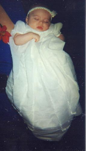 Katie - wearing my Christening gown when she was just a baby. She's now 15 years old.