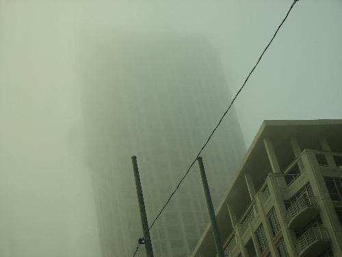 The fog today - This is a condo building downtown that was totally engulfed in fog.