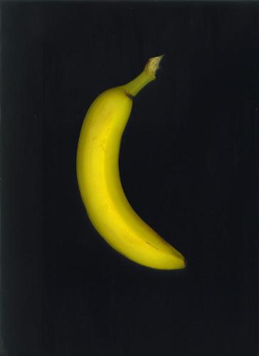 Banana - Yellow banana, black background.