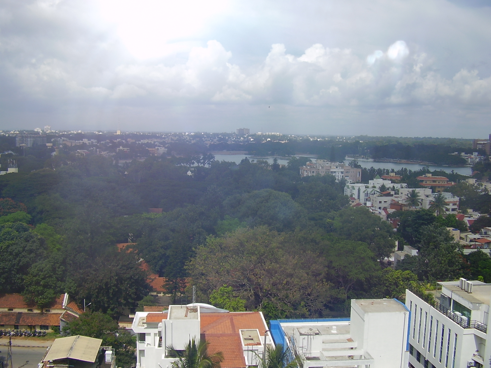 Rooftop picture of a lake in Bangalore - This a pciture from the rooftop in of a hotel in Bangalore, India. A lake can be seen in the distance. It's even lovlier in real life becasue thsi picture is not a panaromic view. I shot this picture along with a few others when I went for lunch at the rooftop restaurant there.