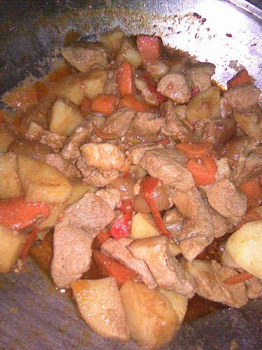 this is AfritADA - Afritada is a meat dish with tomato sauce and potatoes