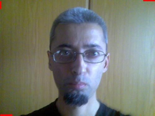 short haircut - that is me ......don't look too long , you may get nightmares!!!
