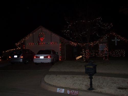 Lights on the House - This is a house in my parent's neighborhood all done up for Christmas. They have a contest in the neighborhood on whose house is the best decorated for the holiday. This was one of my favorites. You can't see the cross on the house very well, but it is a really pretty electric blue. It just didn't show up that well in the picture.