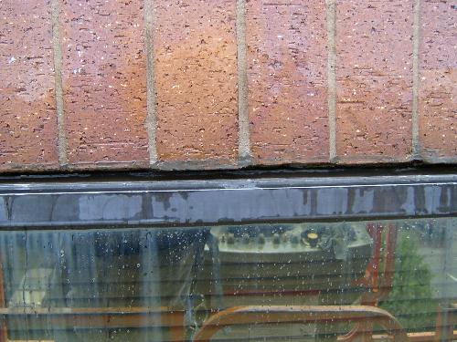 water damage - Here is a picture of some water damage to a window. It is very important to make sure windows are sealed in all seasons and to check them each year. Water leaking in from a window can cause damage to your walls.
