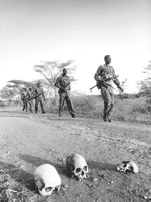 Sudanese terrorists walking - Sudan is dangerous place to live in and to travel to.
