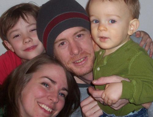 The Whole Family - Kevin, Terri, Caspian, and Zane after getting haircuts.  February 2006.