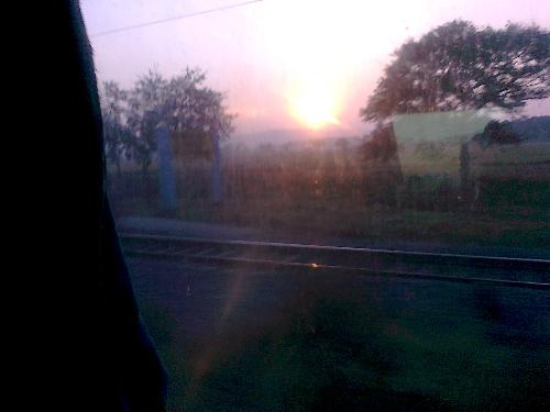 Setting sun - This photograph of setting sun is taken by Nokia mobile X3 while traveling in a train.