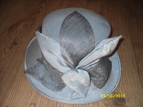 hats - This hat is by jacques vert and is about 8 years old at least my mum wore it to my wedding and it cost about £95 i think!!!