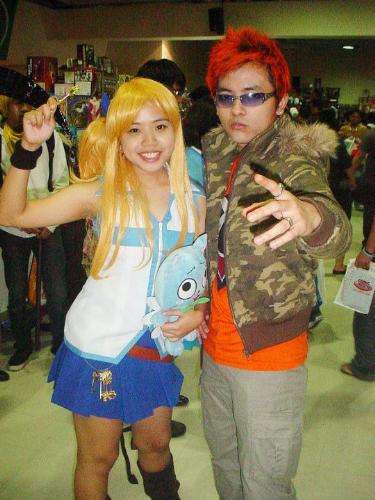 Fairy Tail Cosplay 1 - Fairy Tail cosplay. Me as Lucy Heartfilia and some guy I met at the con as Loke/Leo the Lion.
