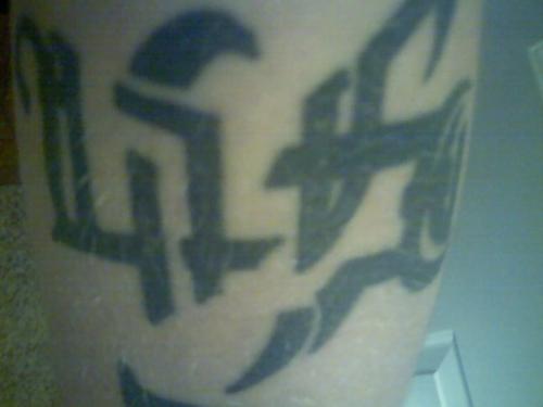 life/death tattoo - This is a picture of one of my tattoos, it says life, then if you turn it upside down it says death. it is located on my left forarm,
