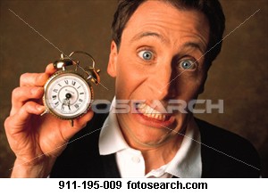 managing time - a man with a time holding