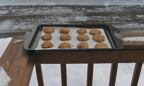 Cookies Cooling - My oatmeal raisin cookies cooling on the rails of my deck. Cookies Cooling - My oatmeal raisin cookies cooling on the rails of my deck.