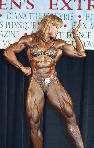 Woman Bodybuilder - She looks lie a man! That is nuts! That is not femine!