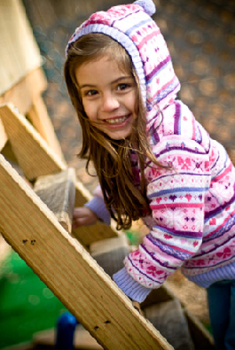 Valya on playset - In a photo shoot where she is on a play set. She will soon appear in ads for a local business that sells sheds, garages and children&#039;s play sets.