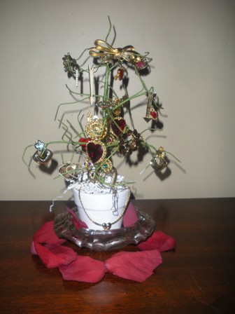 Valentines Themed Tree - A tree I embellished with pieces of heart jewelry. 