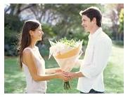 Declaring Love To Your Love One - A man is giving flower to the girl and tell her that he love her.
