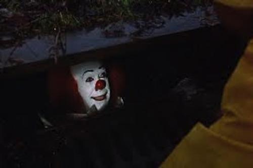 Penny Wise - Here is a shot of Penny Wise from the Stephen King movie IT