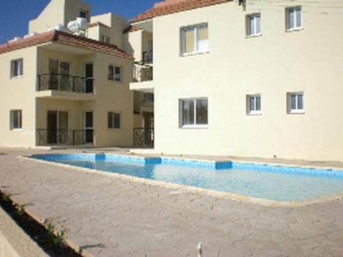 A one bedroom apartment in Paphos - A one bedroom apartment on 2nd floor (top floor) for sale with seaviews over Coral Bay Beach. Fully furnished with airconditioning. £80,000 sterling.