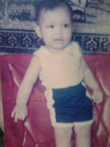 Pic of myself when I was 8 month old.  - This served as a postcard for my dad working abroad. My mom sent this to him.
