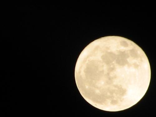 The super moon. - Taken just shortly before the moon reaches the front of my house.