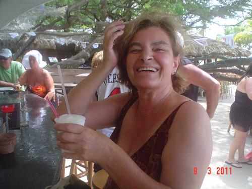 Cheers in Aruba - The suna and a piña colada are a must by the pool in Aruba.