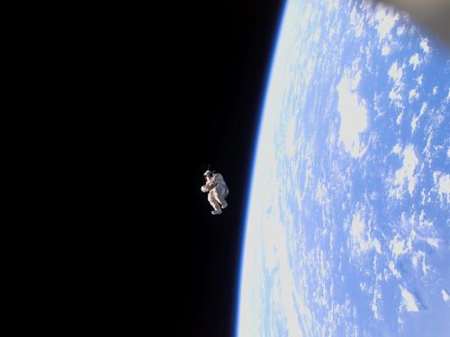 SuitSat-1: A Spacesuit Floats Free  - Who dunnit? Like a scene from a space mystery movie, a spacesuit floated away from the International Space Station earlier this month, but no investigation was needed. It was pushed out by the space station crew. Dubbed Suitsat-1, the unneeded Russian Orlan spacesuit filled mostly with old clothes was fitted with a faint radio transmitter and released to orbit the Earth. Suitsat-1 will orbit once every 90 minutes until it burns up in the Earth's atmosphere within a few weeks. The suit circled the Earth twice before its radio signal became unexpectedly weak. Pictured above, the lifeless spacesuit was photographed as it drifted away from the Earth-orbiting space station earlier this month.