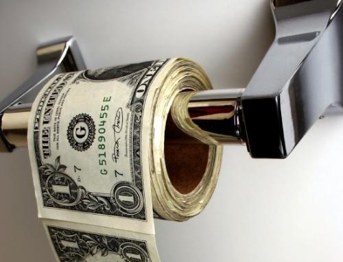 Making extra money online - Money on a toiletpaper holder.