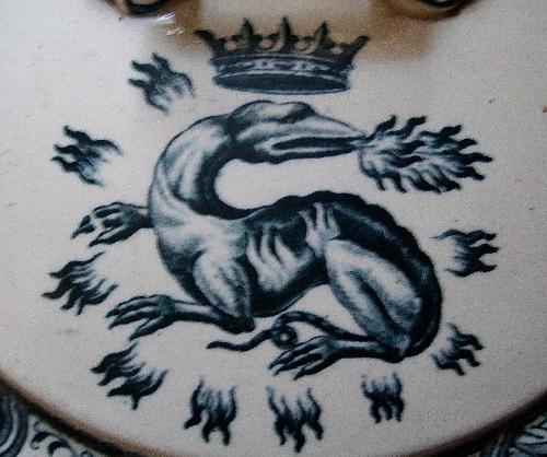 Emblem of king Francis I - A crowned salamander, emblem of king Francis I of France (1494-1547), on the lid of a soup tureen.
