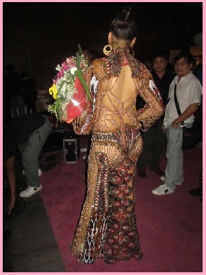 national custome - photo was taken during the bb. pilipinas pageant&#039;s primer. the gown worn by ms. elizabeth clenci won and will later on be worn by the philippines&#039; delegate in the upcoming miss universe pageant in brazil.