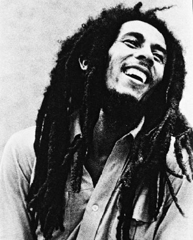 Bob marley - this is the pic of bob marley an african singer!! he is very obsessed with drugs.. i feel when he is performing live he is stoned...