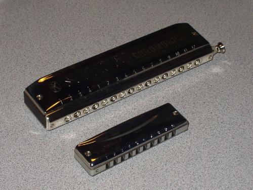 Harmonica's - Two types of Harmonica's. Sometimes refered to as a 'Mounth Organ'!