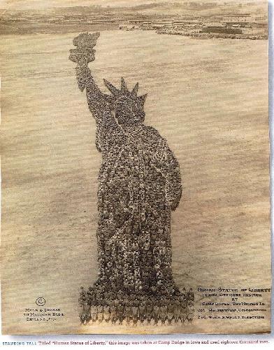 Statue of liberty (18000 men) - I find it amazing that this photo, taken so many years ago, actually still exists! And now, someone has put it on line for all of us to see. This INCREDIBLE picture was taken in 1918.  It is 18,000 men preparing for war in a training camp at Camp Dodge, in Iowa .  EIGHTEEN THOUSAND MEN!!!!!  What a priceless gift from our grandfathers!